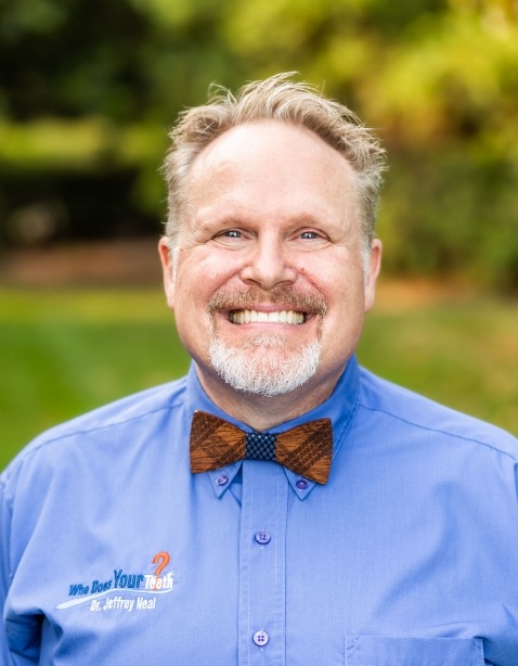 Henrico dentist Doctor Jeffrey Neal smiling in a bow tie